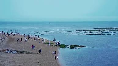 1080升格海边游客风景实拍视频的预览图